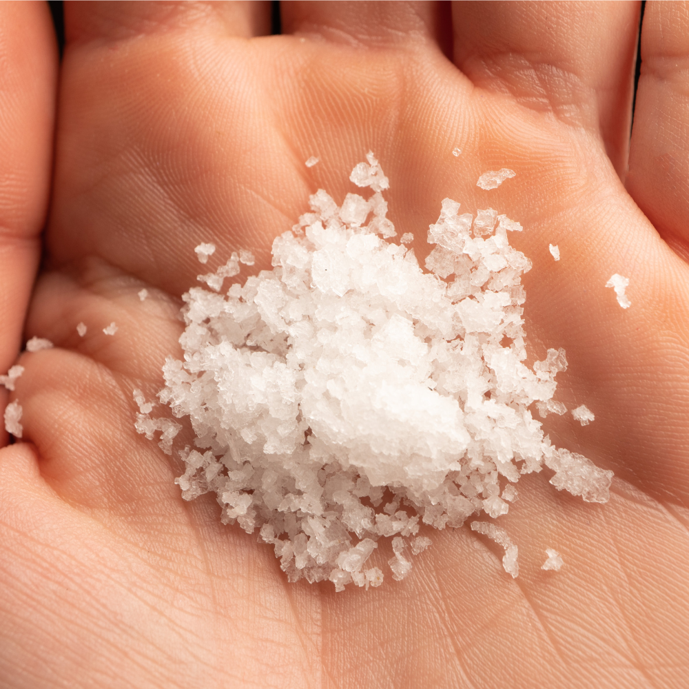 Spicewell - Product - Pocket Sea Salt - Anniversary - Limited Edition Fair Trade - Single-Origin - Hand-Harvested - Lifestyle - Macro Product On Hand